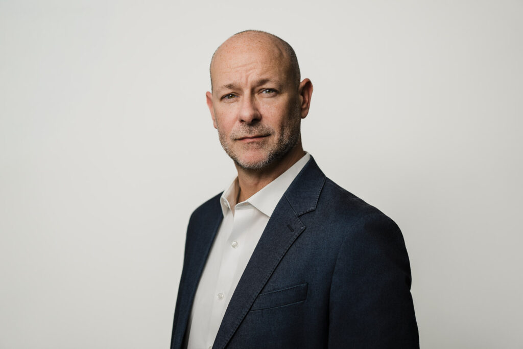 Confident male executive professional headshot on clean background by Alex Kaplan New Jersey
