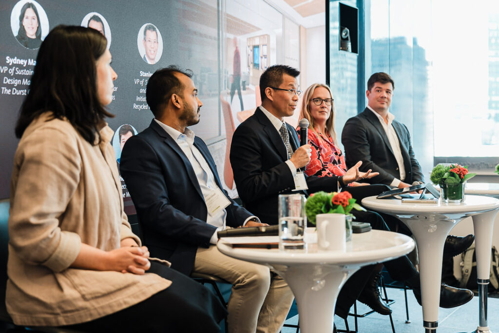Panel of experts sharing insights on architectural glass at Climate Week NYC, photo by Alex Kaplan Photography.
