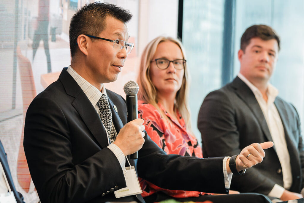 Stanley Yee speaking during panel session at Climate Week NYC Circularity in Practice, photographed by Alex Kaplan.