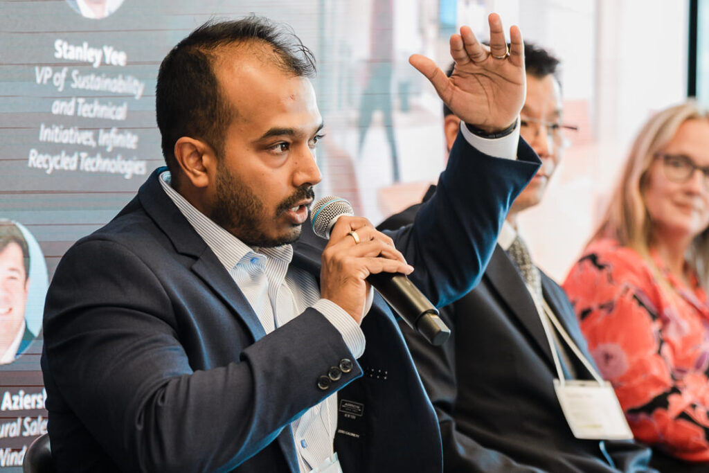 Panelist Archan Ghosh presenting during Climate Week NYC event, captured by Alex Kaplan Photography.
