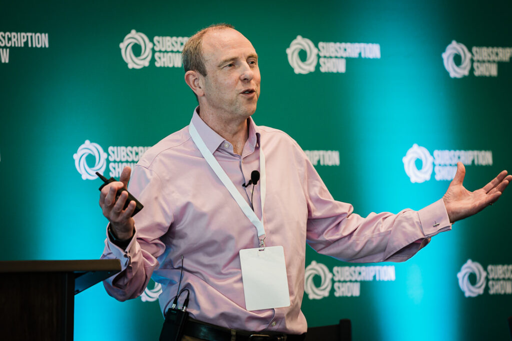 motivational-speaker-addressing-audience-at-conference-by-alex-kaplan-photography