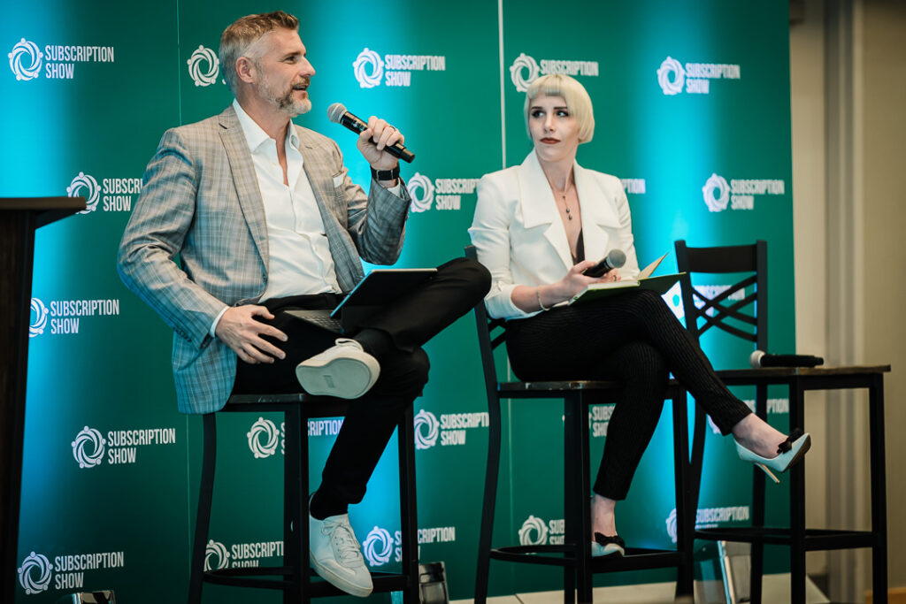 02-speakers-on-stage-during-business-leadership-panel-by-alex-kaplan-photography