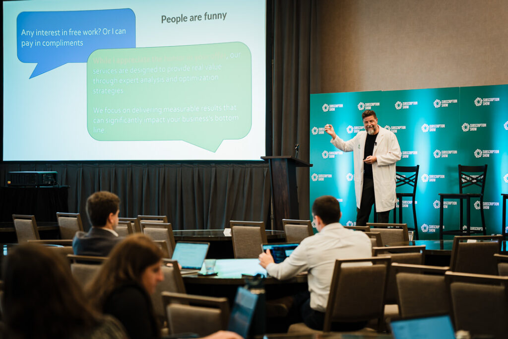 speaker-discussing-people-and-performance-slide-at-corporate-seminar-by-alex-kaplan-photography