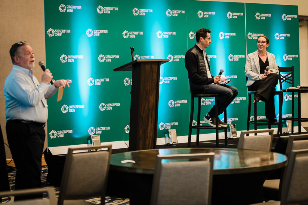 panel-discussion-with-speakers-onstage-during-subscription-show-by-alex-kaplan-photography