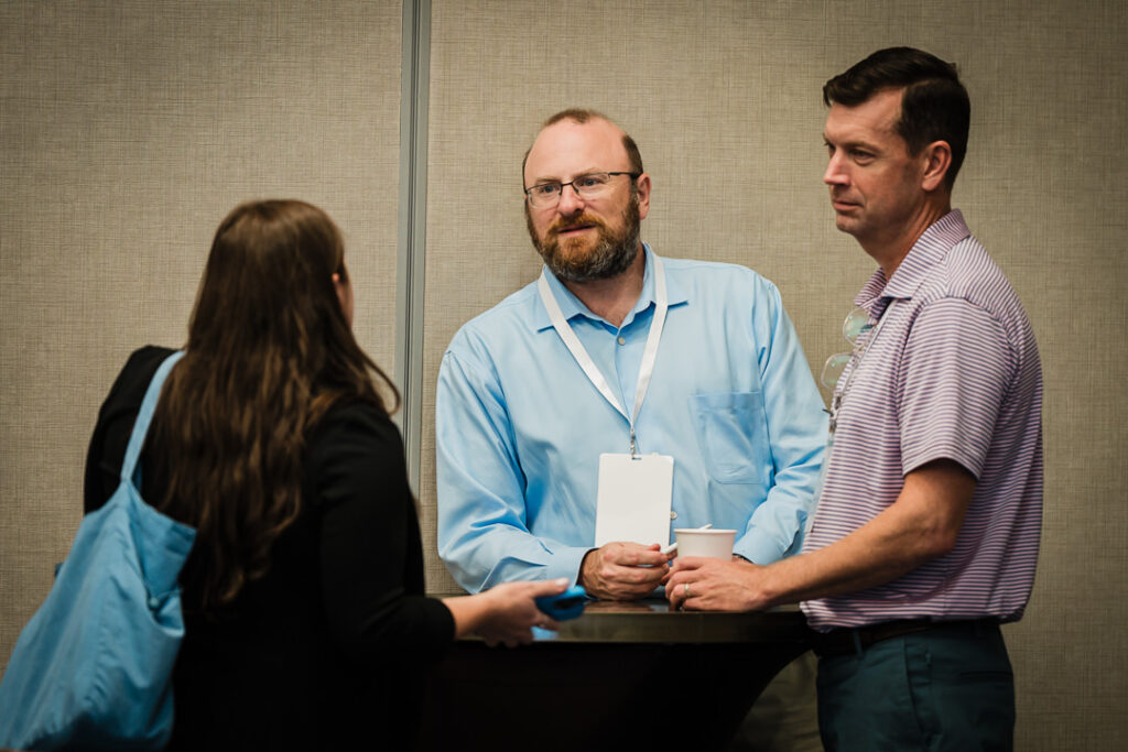 attendees-networking-and-talking-during-conference-break-by-alex-kaplan-photography