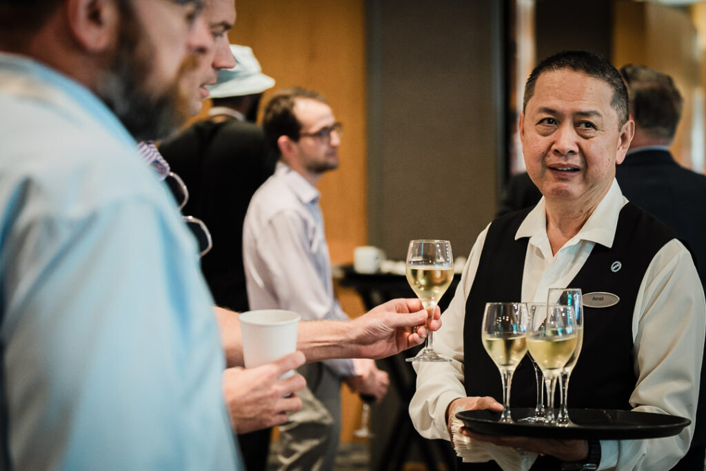 business-professionals-enjoying-drinks-at-networking-reception-by-alex-kaplan-photography