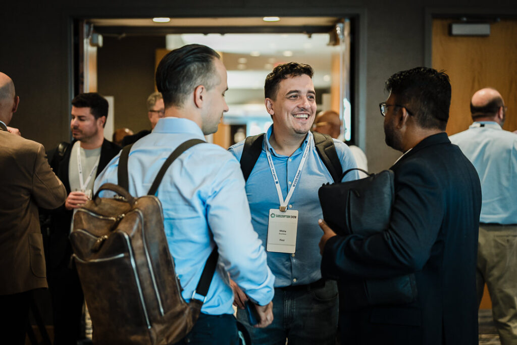 professionals-smiling-and-talking-during-event-networking-by-alex-kaplan-photography