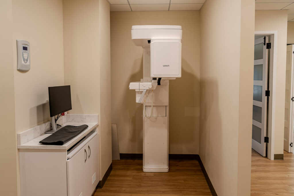 Complete dental imaging room featuring Vatech equipment, computer workstation, and marble countertop, Alex Kaplan Photography healthcare branding