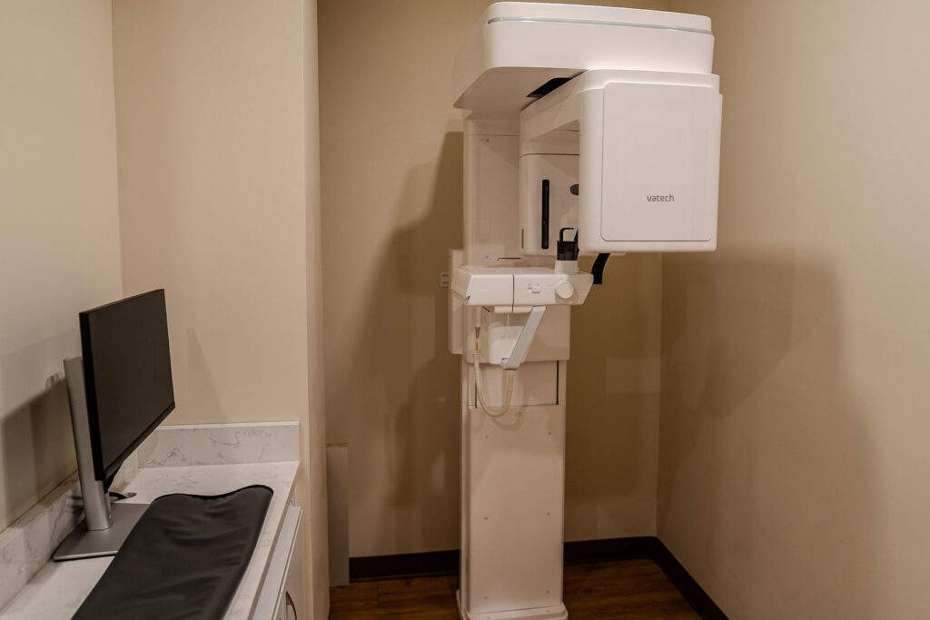 Close-up view of Vatech panoramic dental X-ray machine showing modern digital imaging technology, medical equipment photography by Alex Kaplan