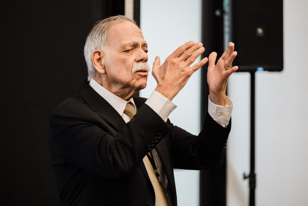 Speaker sharing animated remarks during Helen Keller National Center Walters-Smithdas Legacy Atrium dedication
