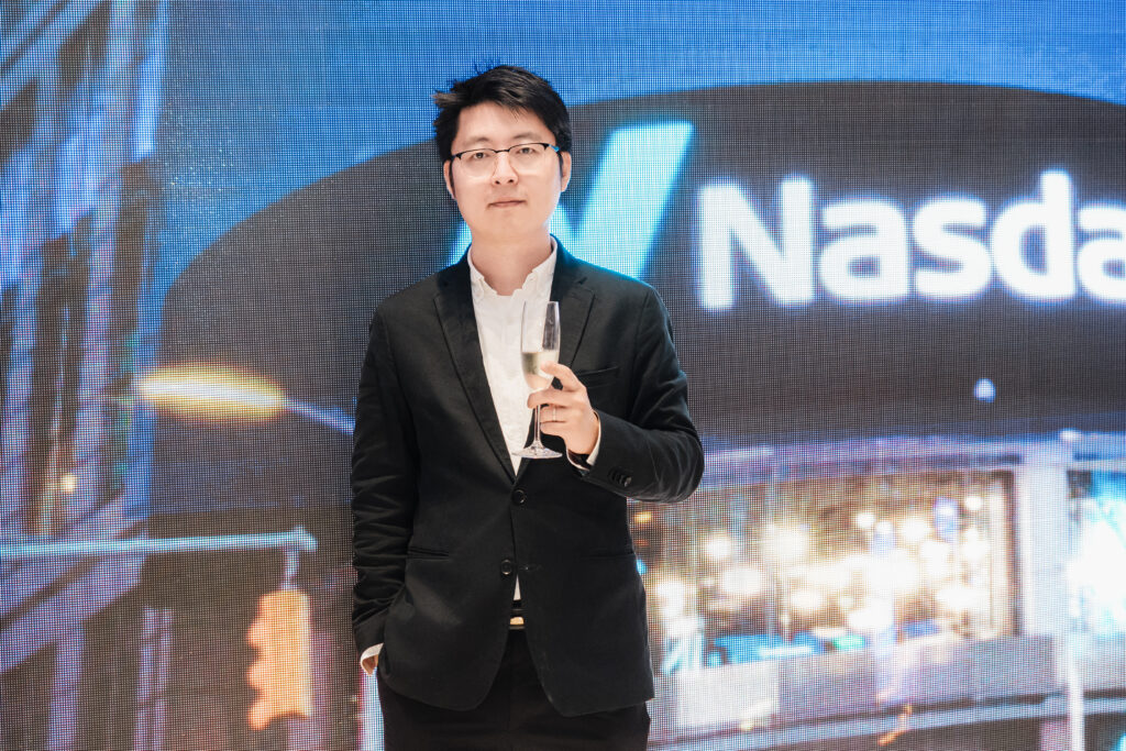 Executive champagne toast Nasdaq IPO Linkhome AI celebration event photography New York