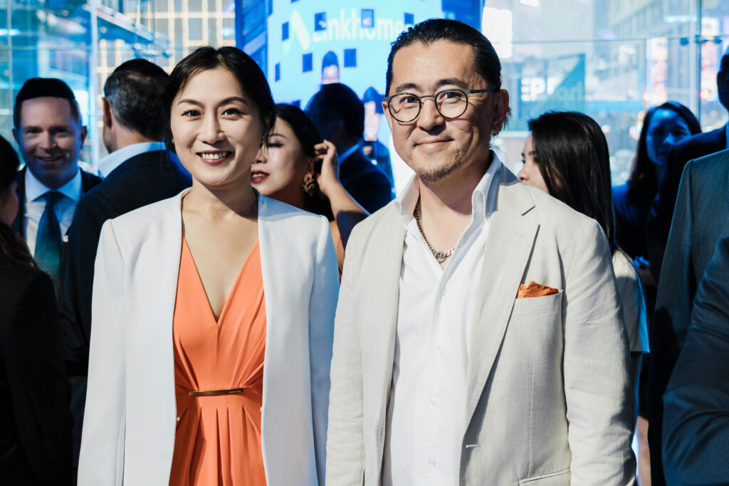 Professional corporate portrait Nasdaq MarketSite Linkhome AI IPO celebration event photography