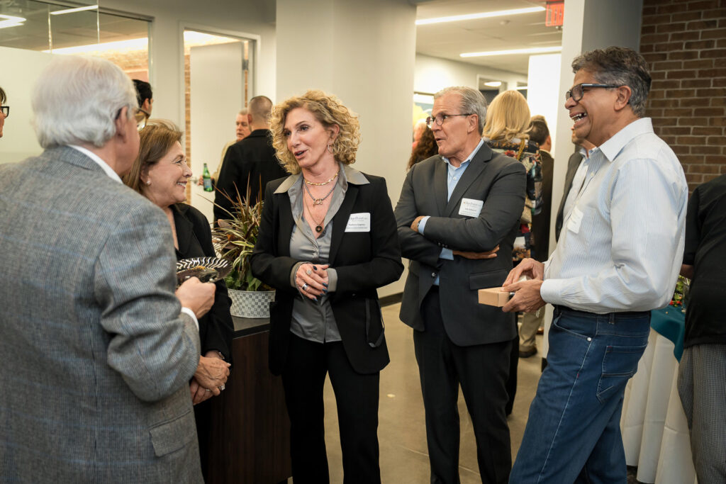 Senior professionals networking at New Jersey wealth management event