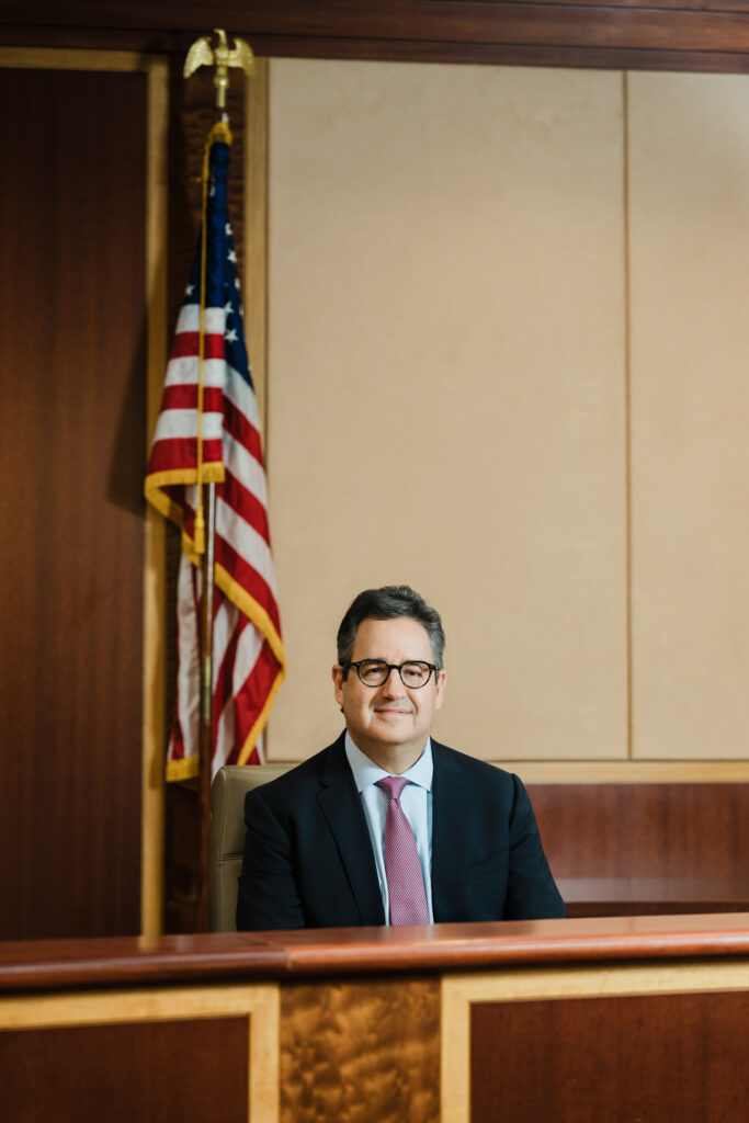 Corporate attorney headshot in courtroom setting, Northern New Jersey professional photographer