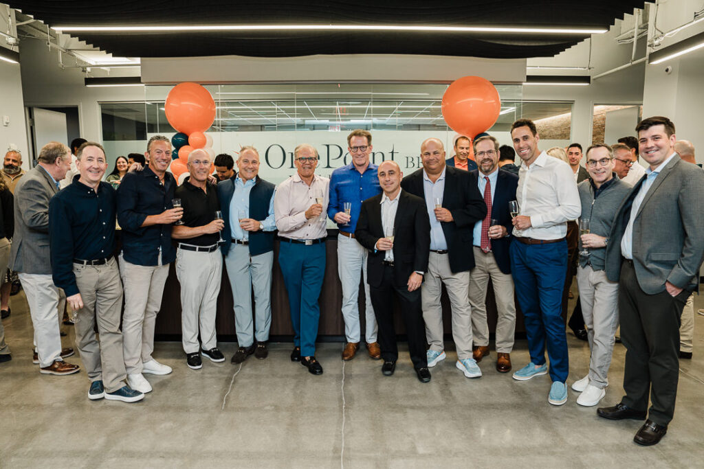 Multi-generational team of advisors at OnePoint brand launch event