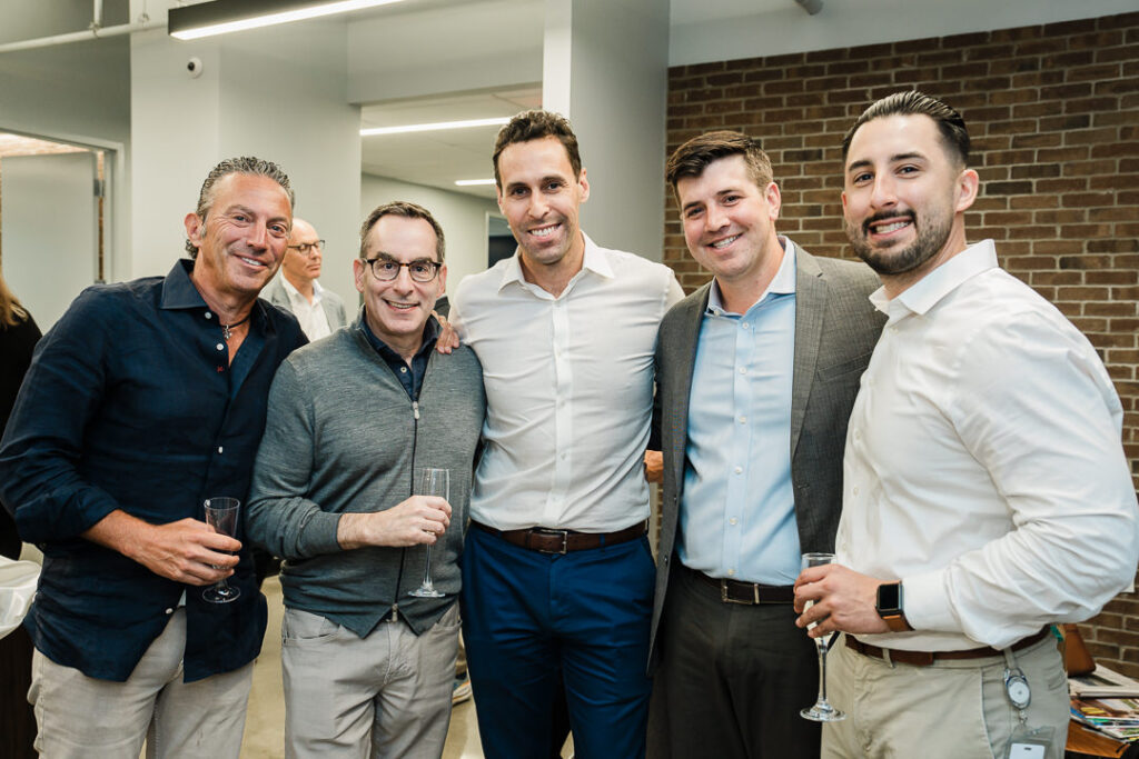 Professional team photo at OnePoint BFG Wealth Partners brand launch