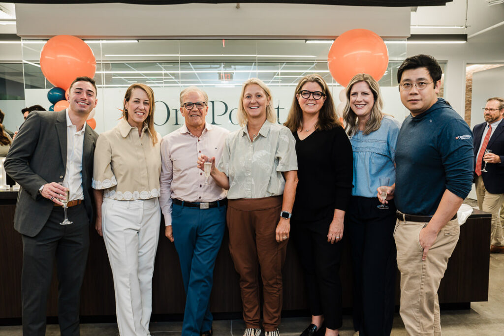 Team members and guests networking at OnePoint BFG Wealth Partners event