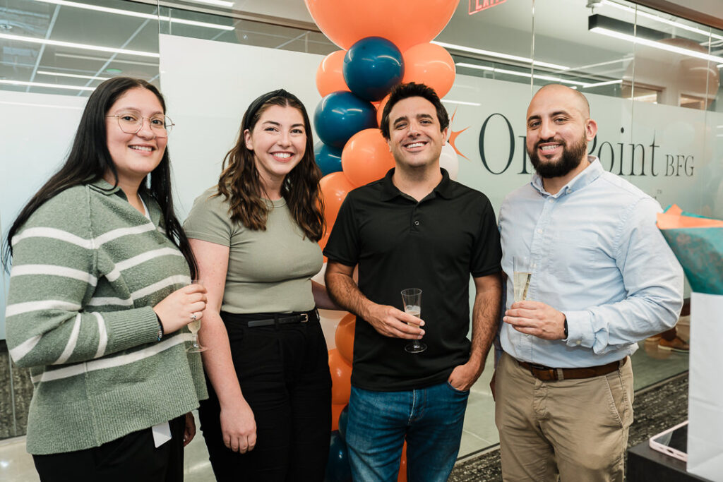 OnePoint wealth advisors and staff members at brand launch celebration