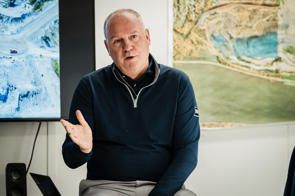 Tilcon CEO speaking with hand gestures during town hall Q&A session at Clinton Point Quarry
