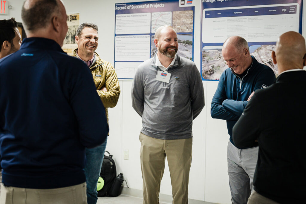 Three Tilcon executives sharing a laugh during Clinton Point Quarry CEO visit meeting