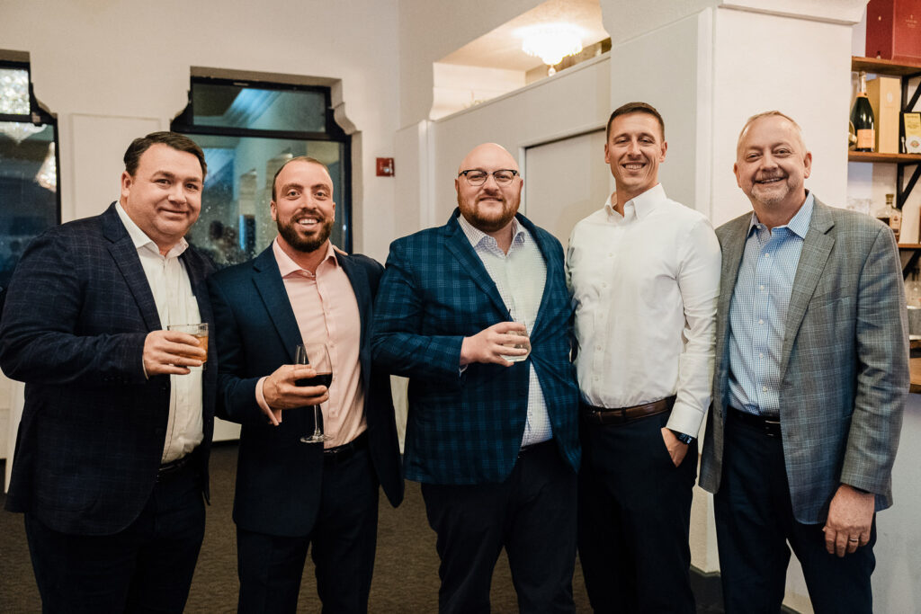 Business professionals team group photo at corporate awards event by Alex Kaplan Photography Northern NJ