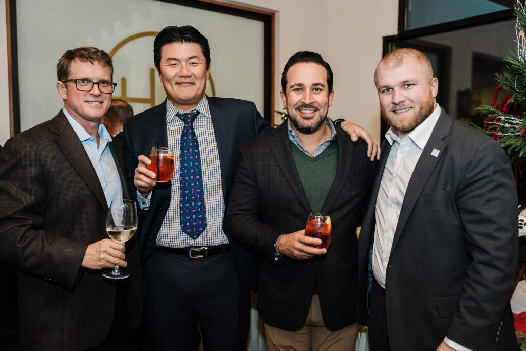 Corporate event attendees during awards ceremony at The High Lawn photographed by Alex Kaplan