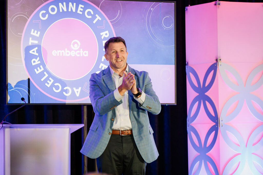 Corporate keynote applause moment captured by Alex Kaplan Photography