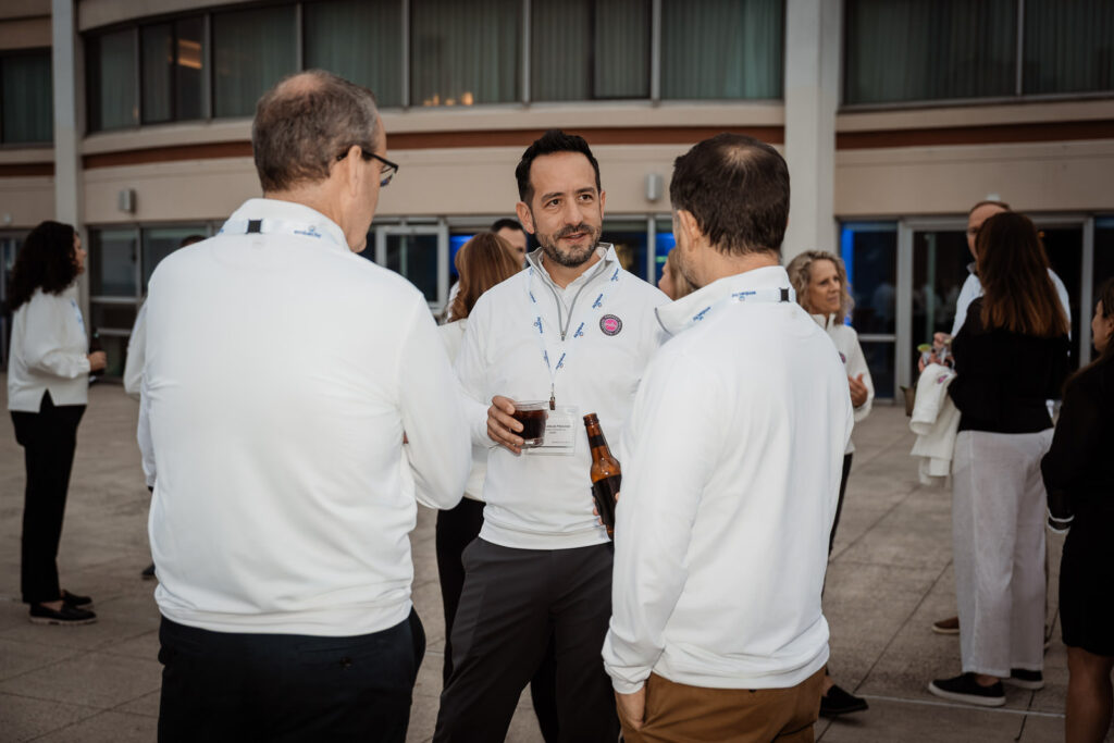 Corporate professionals networking at Jersey City venue by Alex Kaplan Photography
