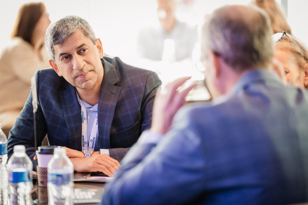 Corporate roundtable discussion photographed by Alex Kaplan