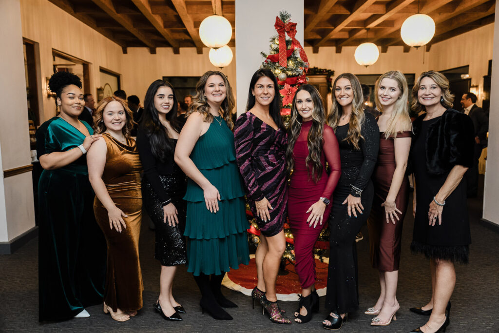Diverse corporate team group photo at awards dinner by Alex Kaplan Photography West Orange