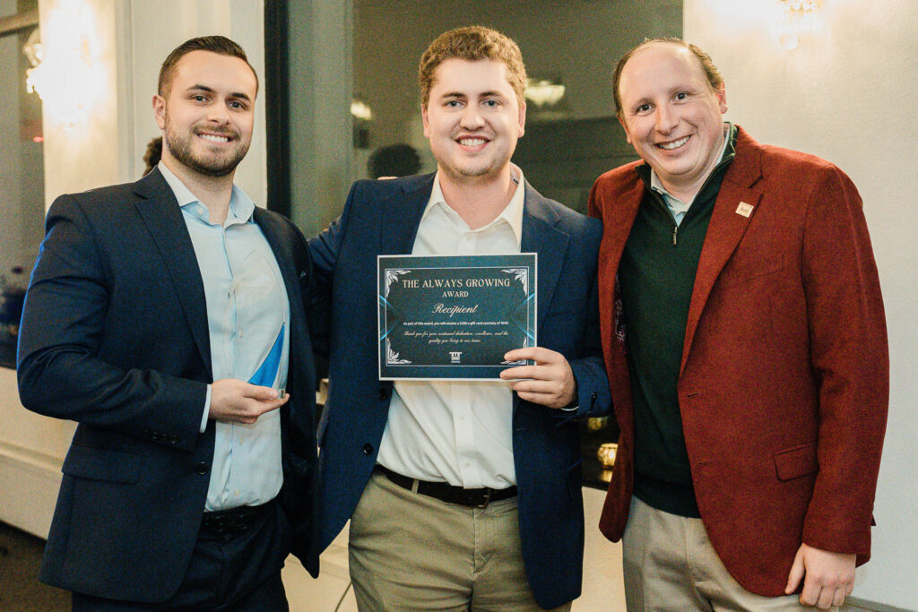 Corporate leader with award recipient at RMR Wealth Builders dinner photographed by Alex Kaplan