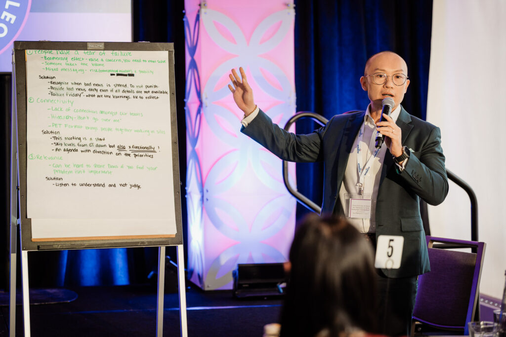 Presenter leading whiteboard workshop session by Alex Kaplan