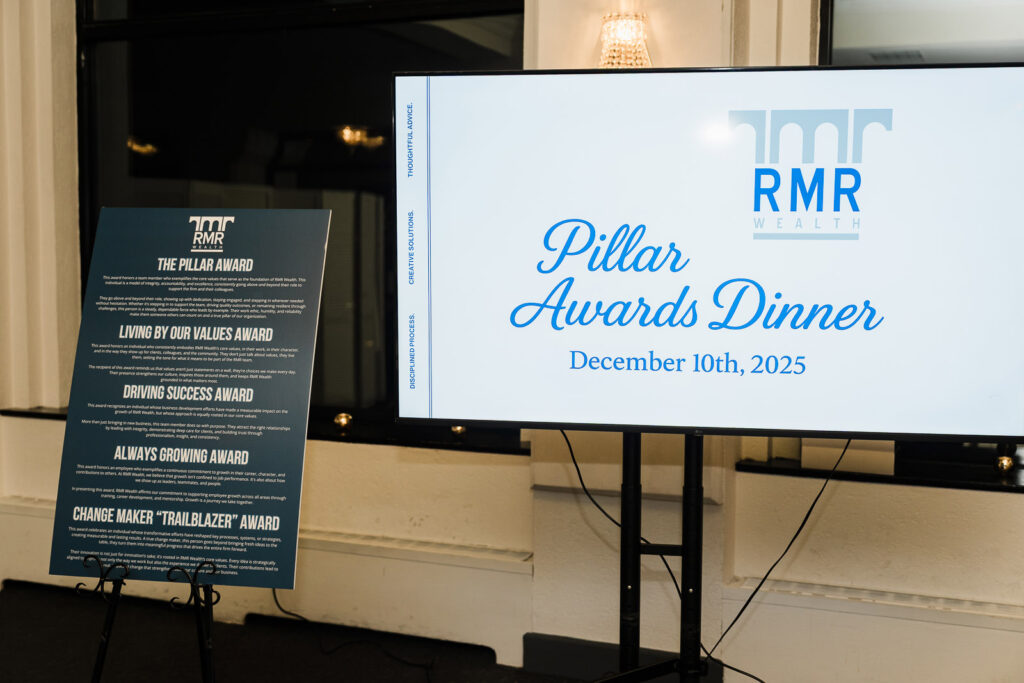 RMR Wealth Builders Pillar Awards Dinner presentation screen and award descriptions photographed by Alex Kaplan