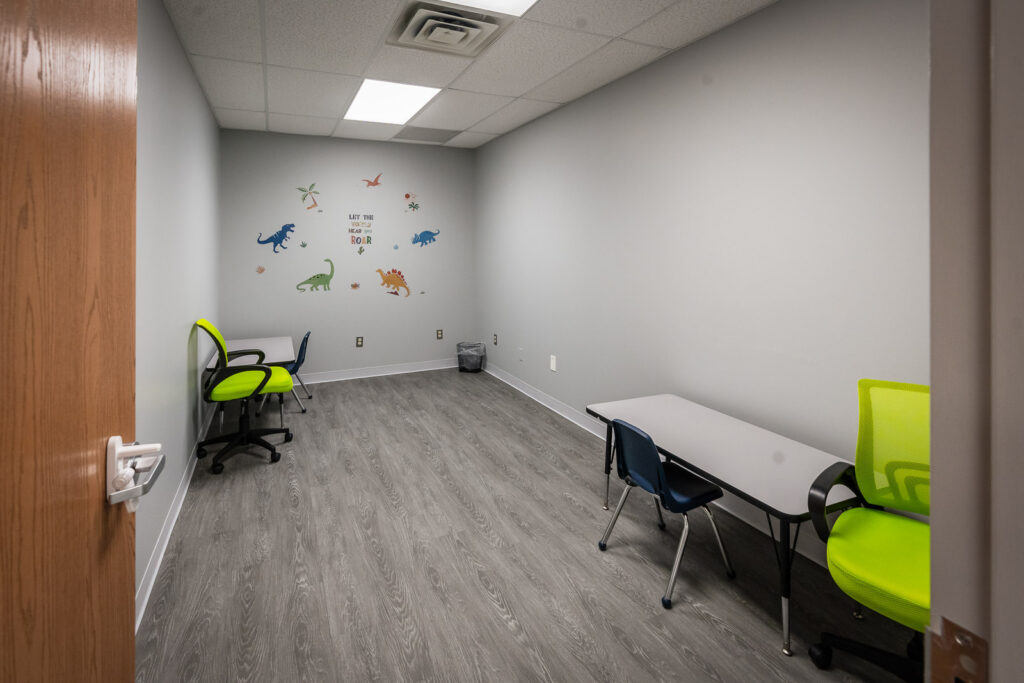 The Perfect Child individual therapy room with dinosaur wall decals Edison NJ