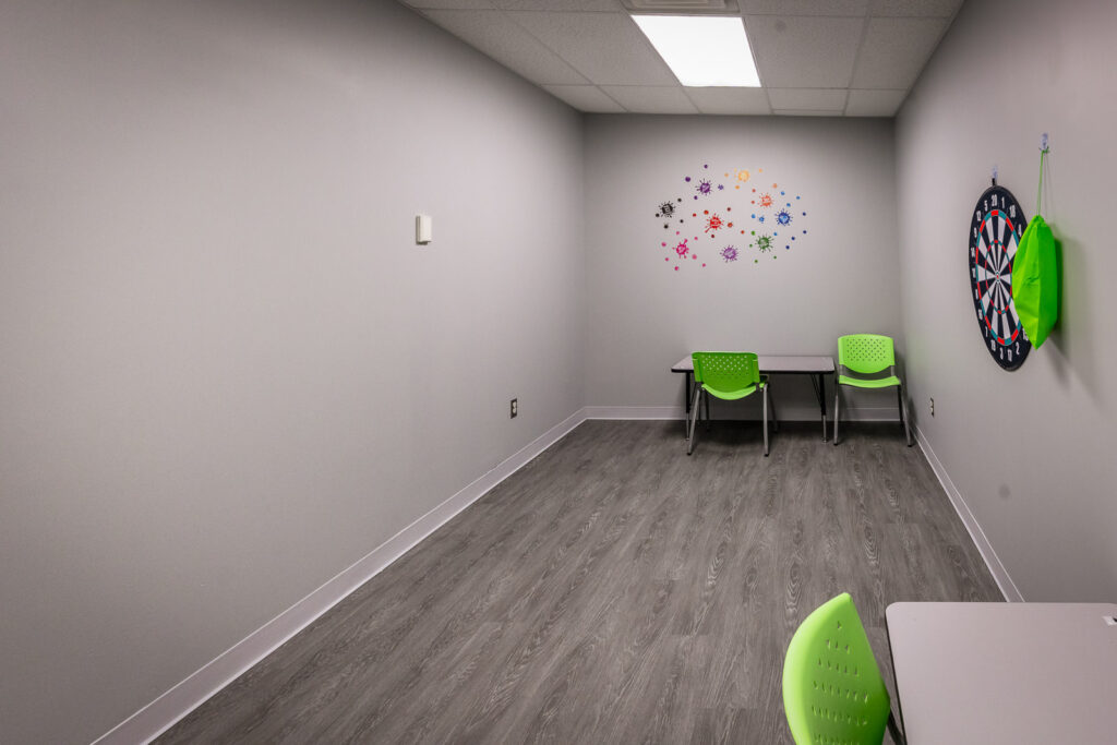 The Perfect Child therapy room with colorful educational wall decals Edison NJ