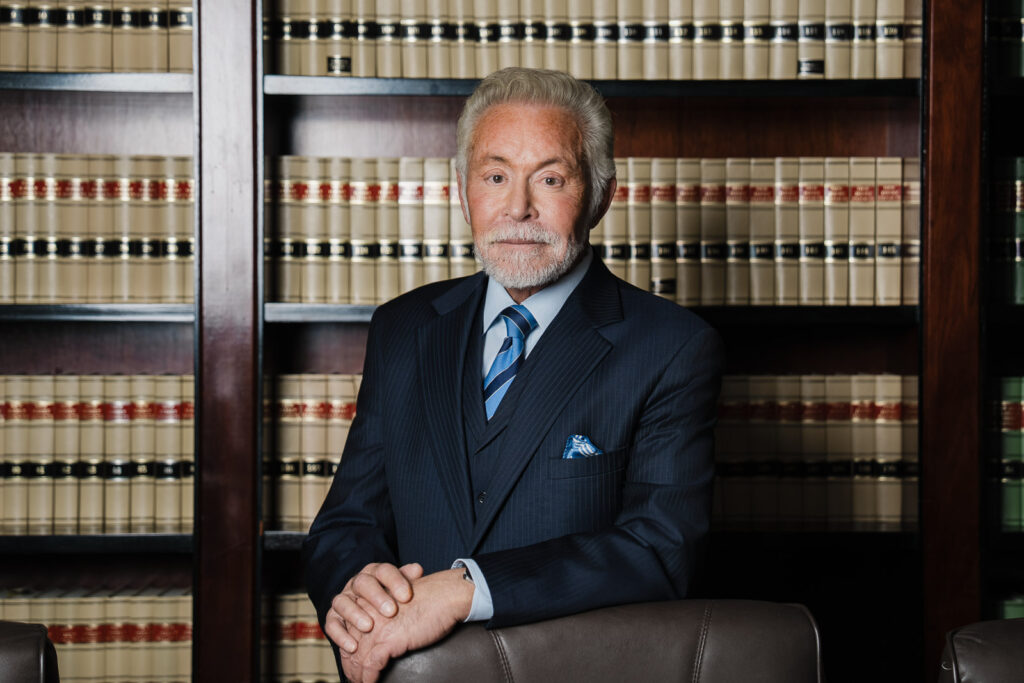 Distinguished senior partner attorney professional headshot in Maggiano Law Firm library by Alex Kaplan corporate photographer NJ