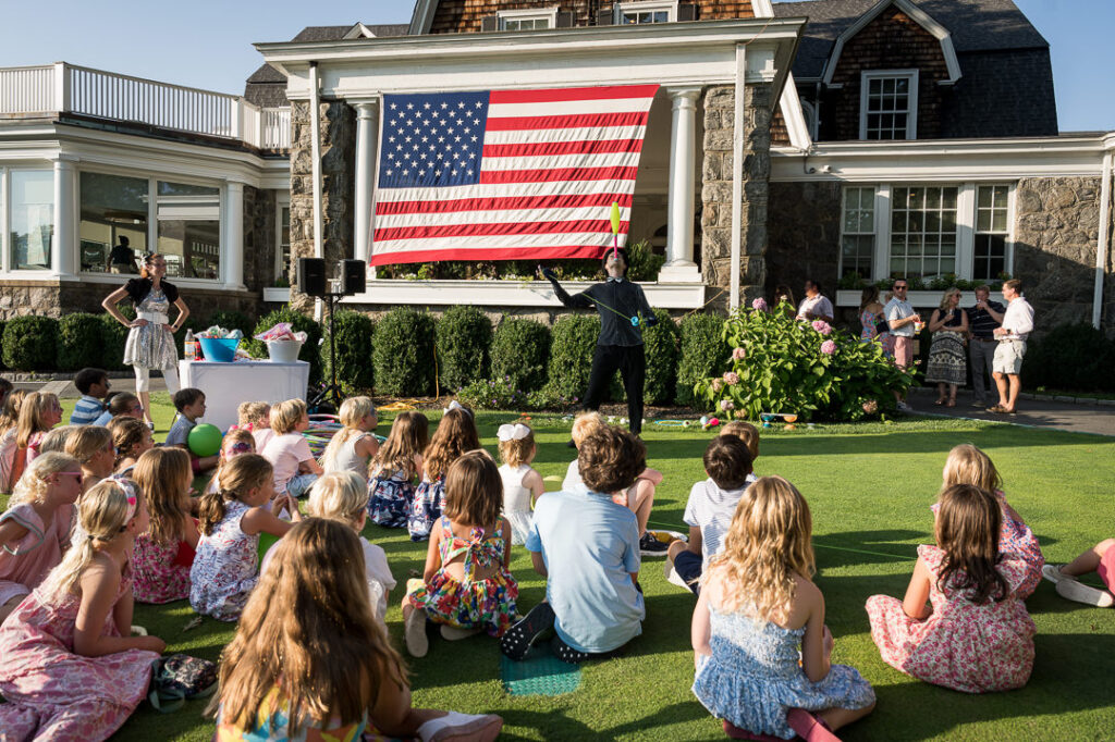 Group of friends at The Apawamis Club Labor Day celebration photographed by Alex Kaplan