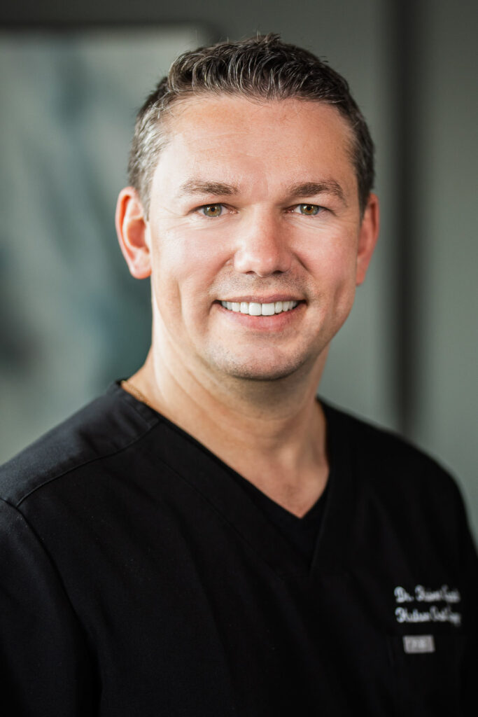 Professional portrait of an oral surgeon at Hudson Oral Surgery