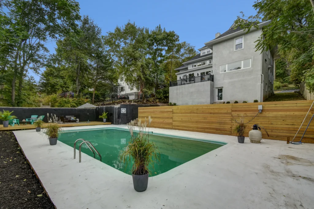 Backyard pool and outdoor entertaining area in New Jersey home