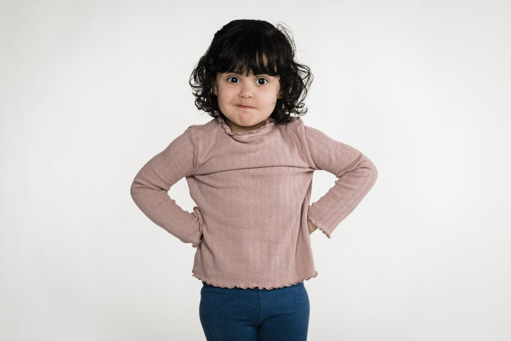 Child actor headshots NJ toddler hands on hips attitude pose full length white background