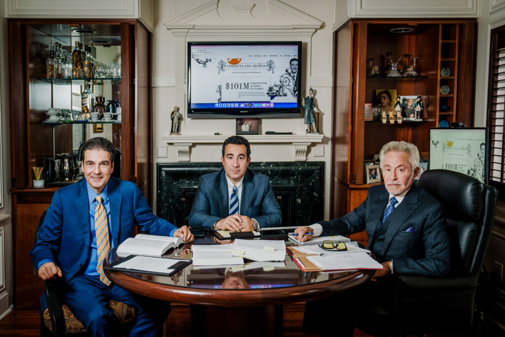 Maggiano Law Firm partners working at conference table professional office portrait Bergen County