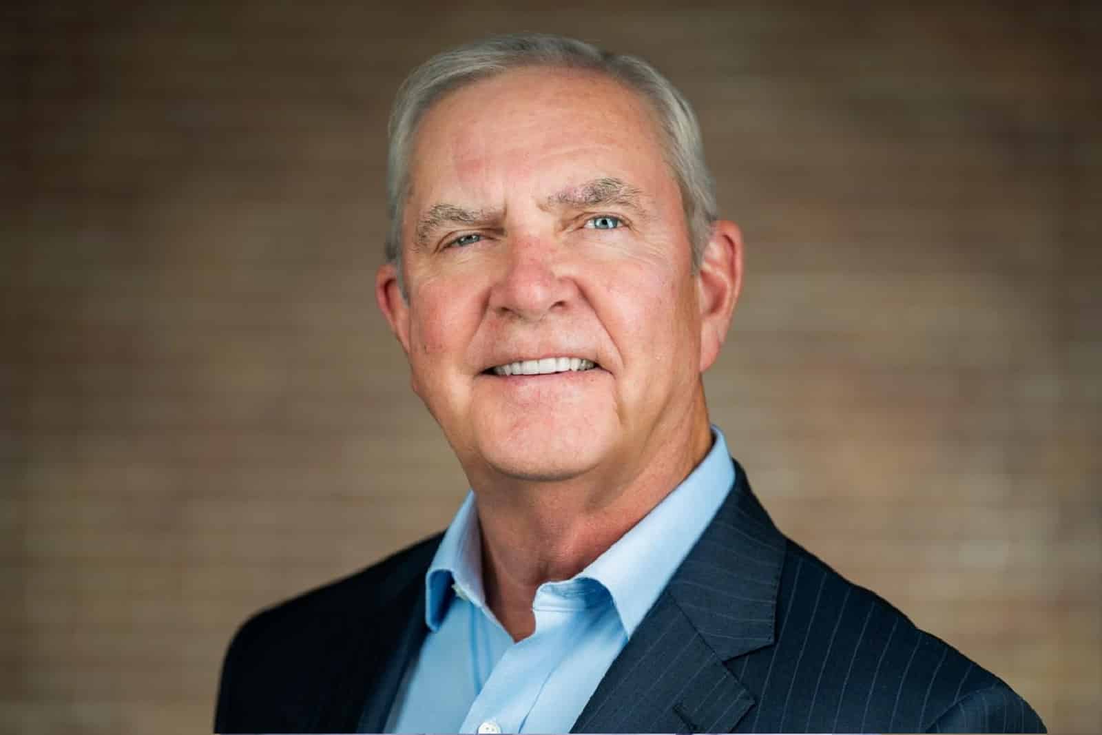 Executive corporate headshot of senior man in dark pinstripe suit Parsippany NJ