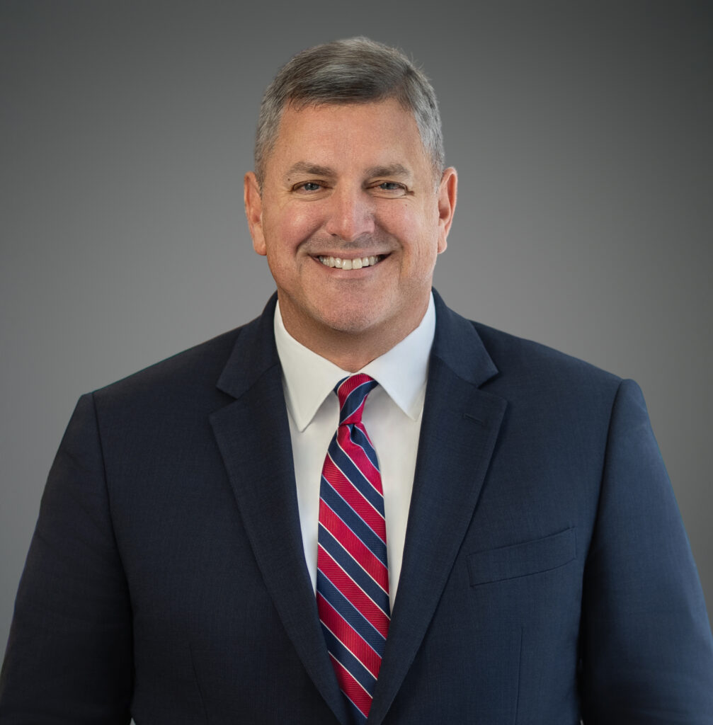 Approachable executive headshot of a smiling professional in New Jersey