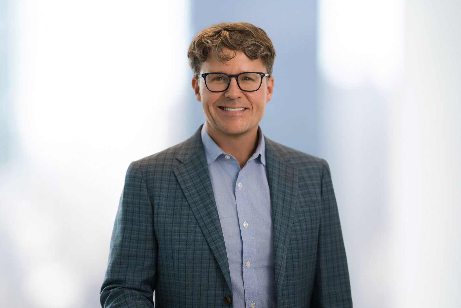 LinkedIn headshot retouching NJ — authentic, natural portrait for business professionals