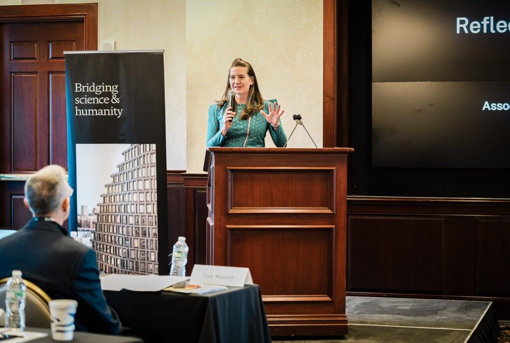 female speaker podium corporate event photography nj 1024x690