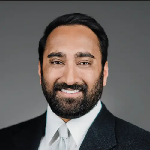 Professional headshot of a real estate investment firm executive in New Jersey