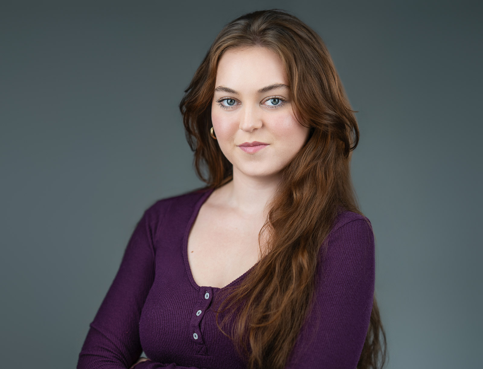 Professional actor headshot in NYC with natural expression and strong eye contact.