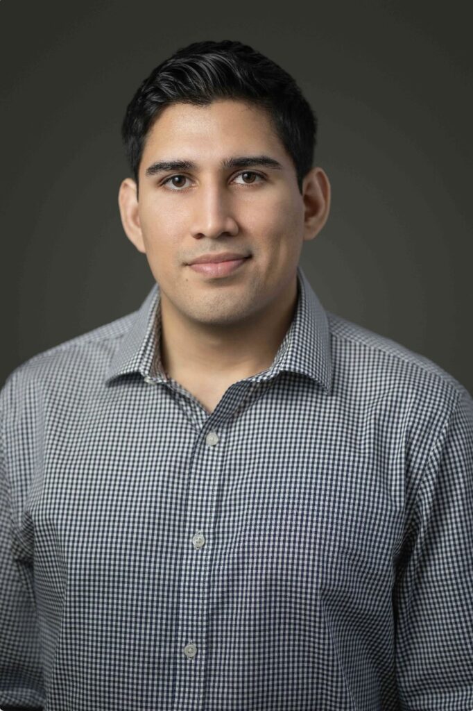 Corporate team headshot for Josue photographed at EXP Group office in North Bergen NJ