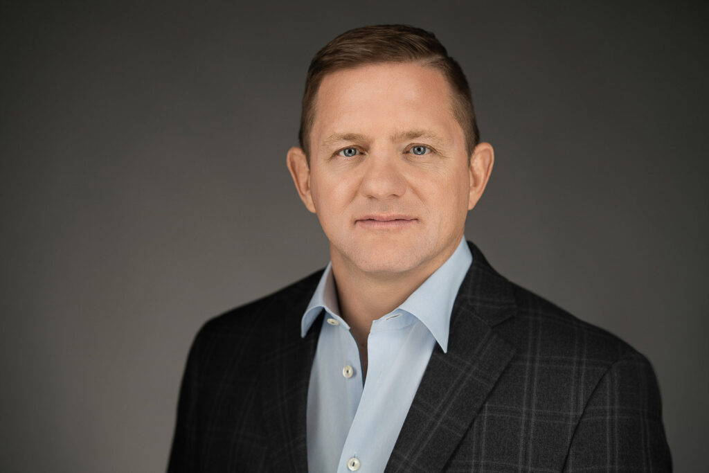Modern LinkedIn photo update for a professional showing approachable confidence and contemporary styling