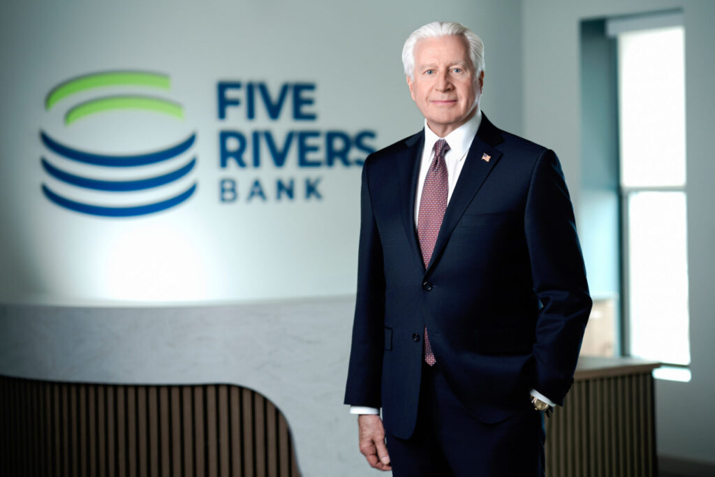 Personal branding photography session for a bank CEO photographed in his branded NJ lobby.